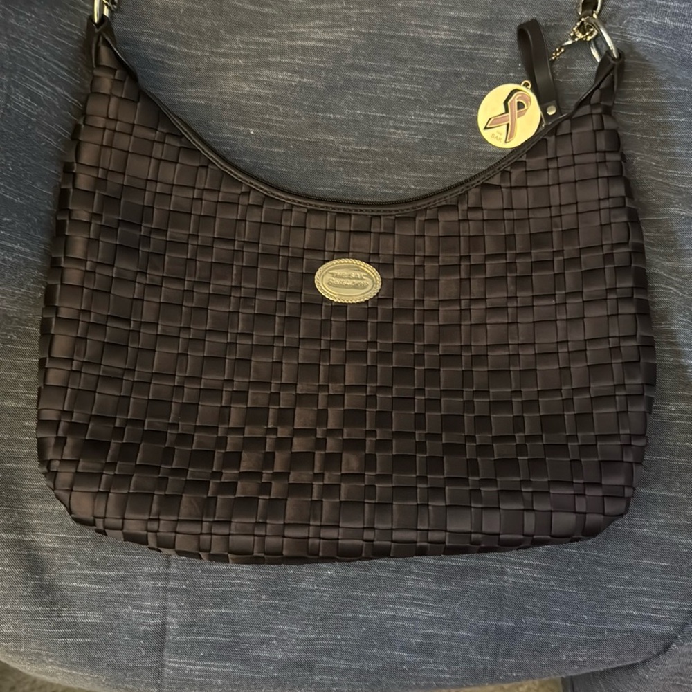 The Sak
Elegant Black Woven Shoulder Bag